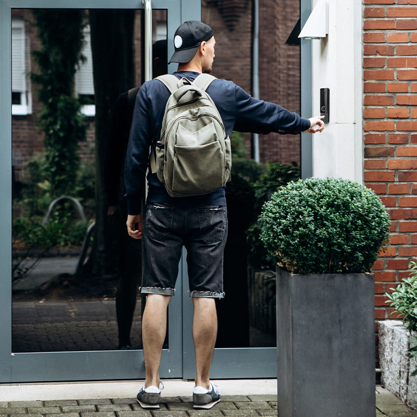Person entering a multifamily property gate